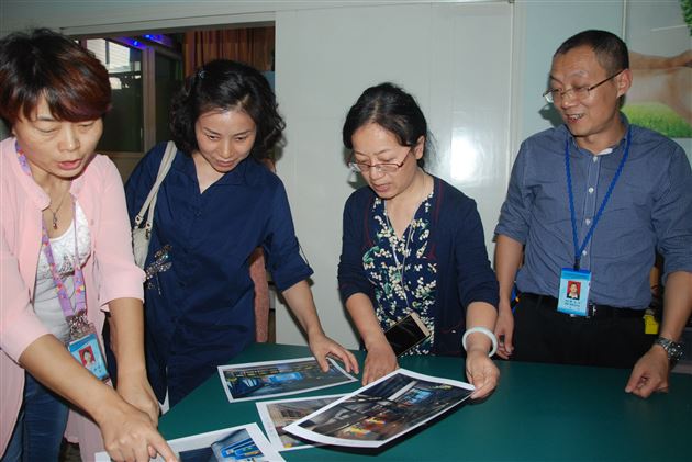 双流区科技局领导莅临棠外附小参观交流