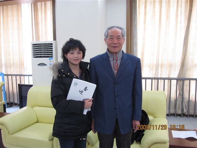 与教育杂志社总编辑徐民和合影留念